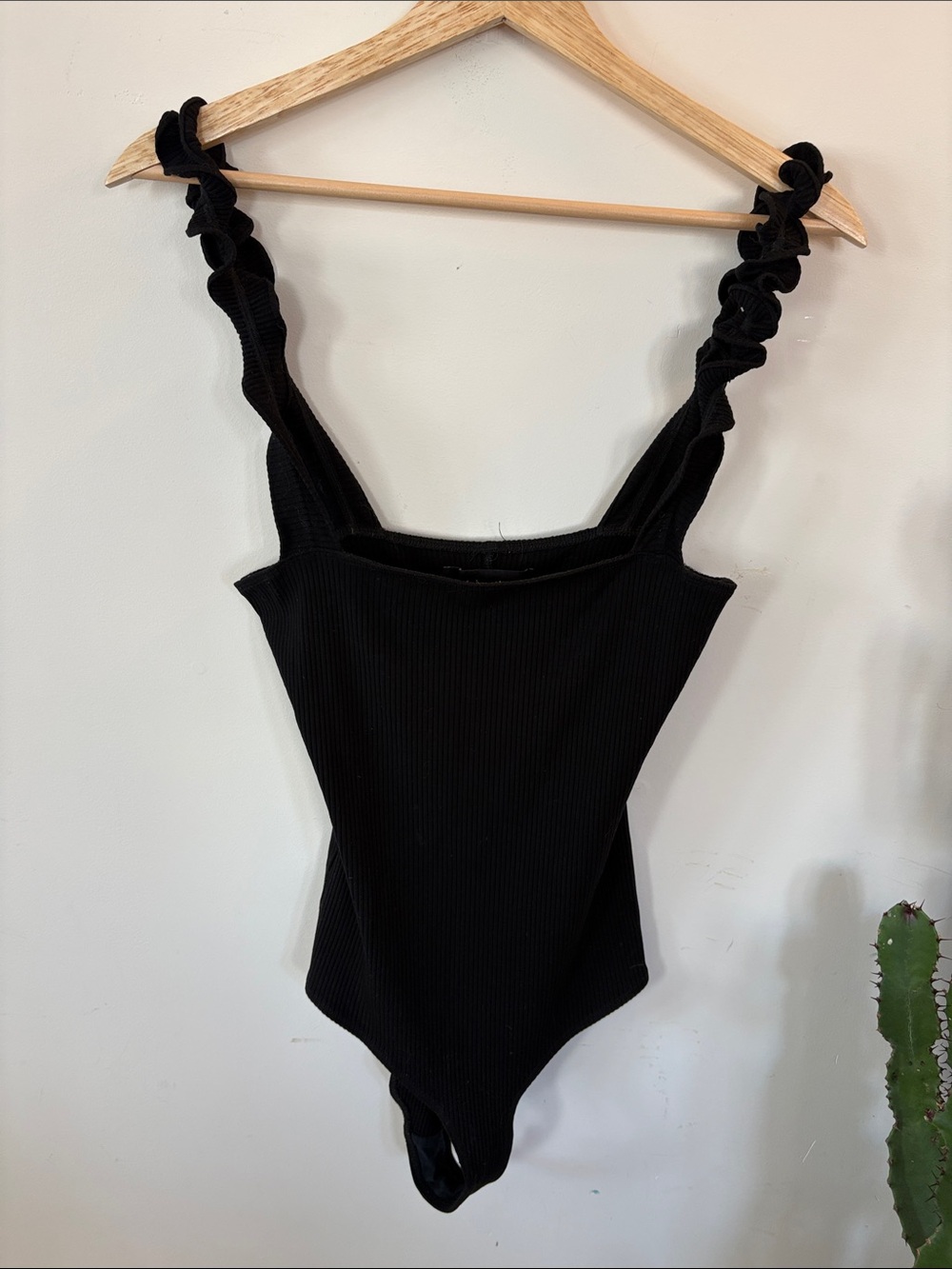 Reformation Black Ribbed One-Piece Bodysuit with Ruched Straps